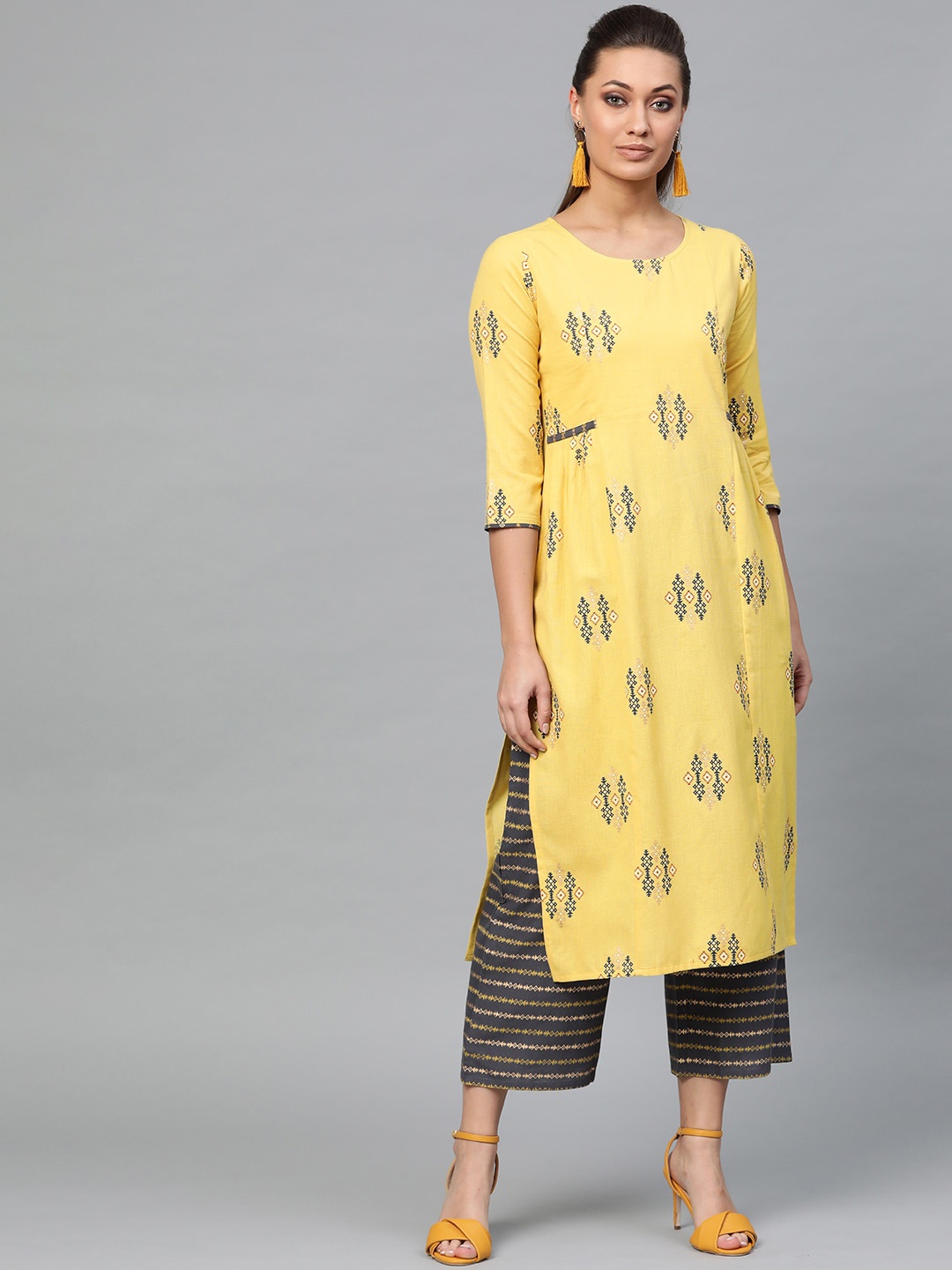 

Indo Era Women Yellow Printed Pleated Pure Cotton Kurta with Palazzos