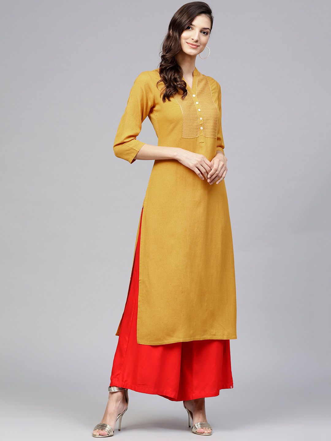 

Libas Women Yellow Yoke Design Thread Work Kurta