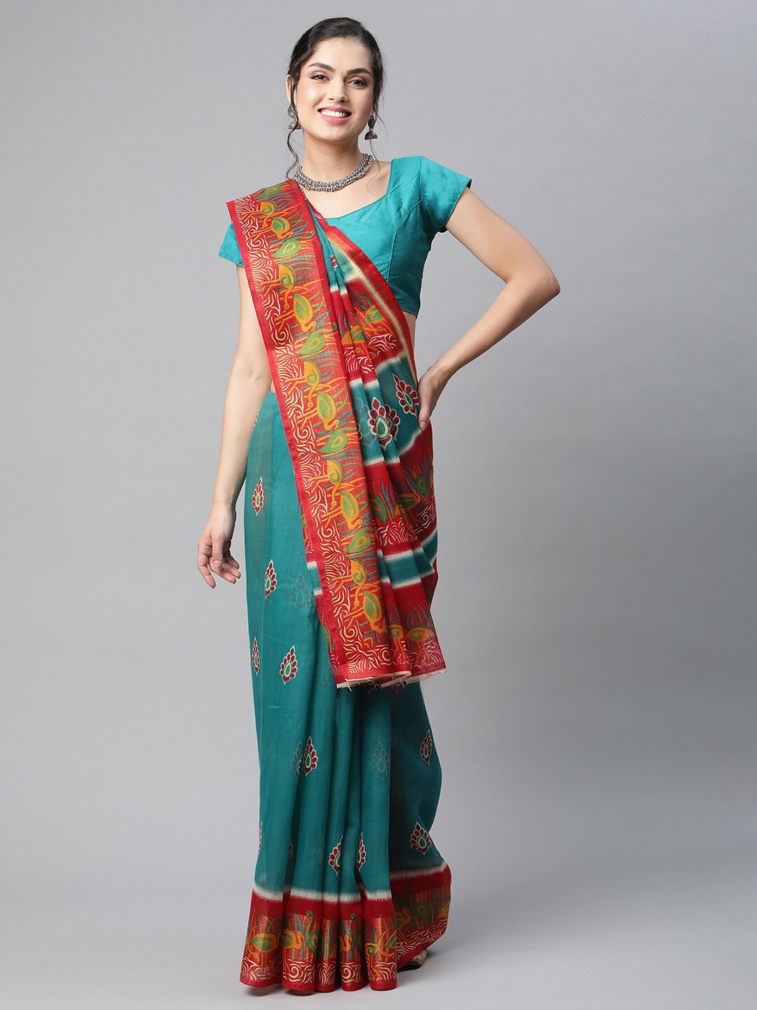 

OM SAI LATEST CREATION Teal & Red Ethnic Motifs Saree