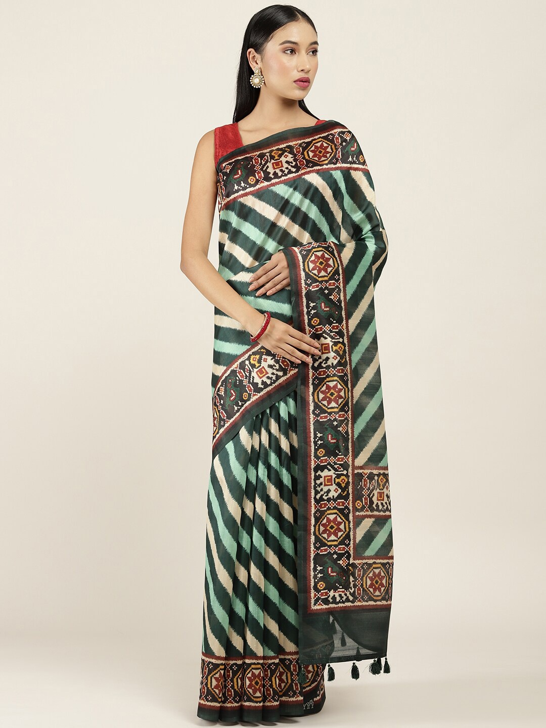 

Soch Green & Beige Striped Silk Blend Saree