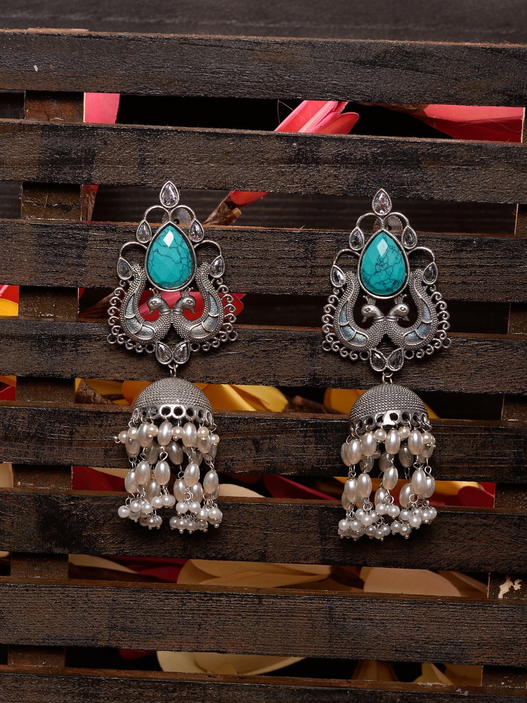 

Saraf RS Jewellery Silver-Toned & Turquoise Blue Oxidised Dome Shaped Jhumkas Earrings