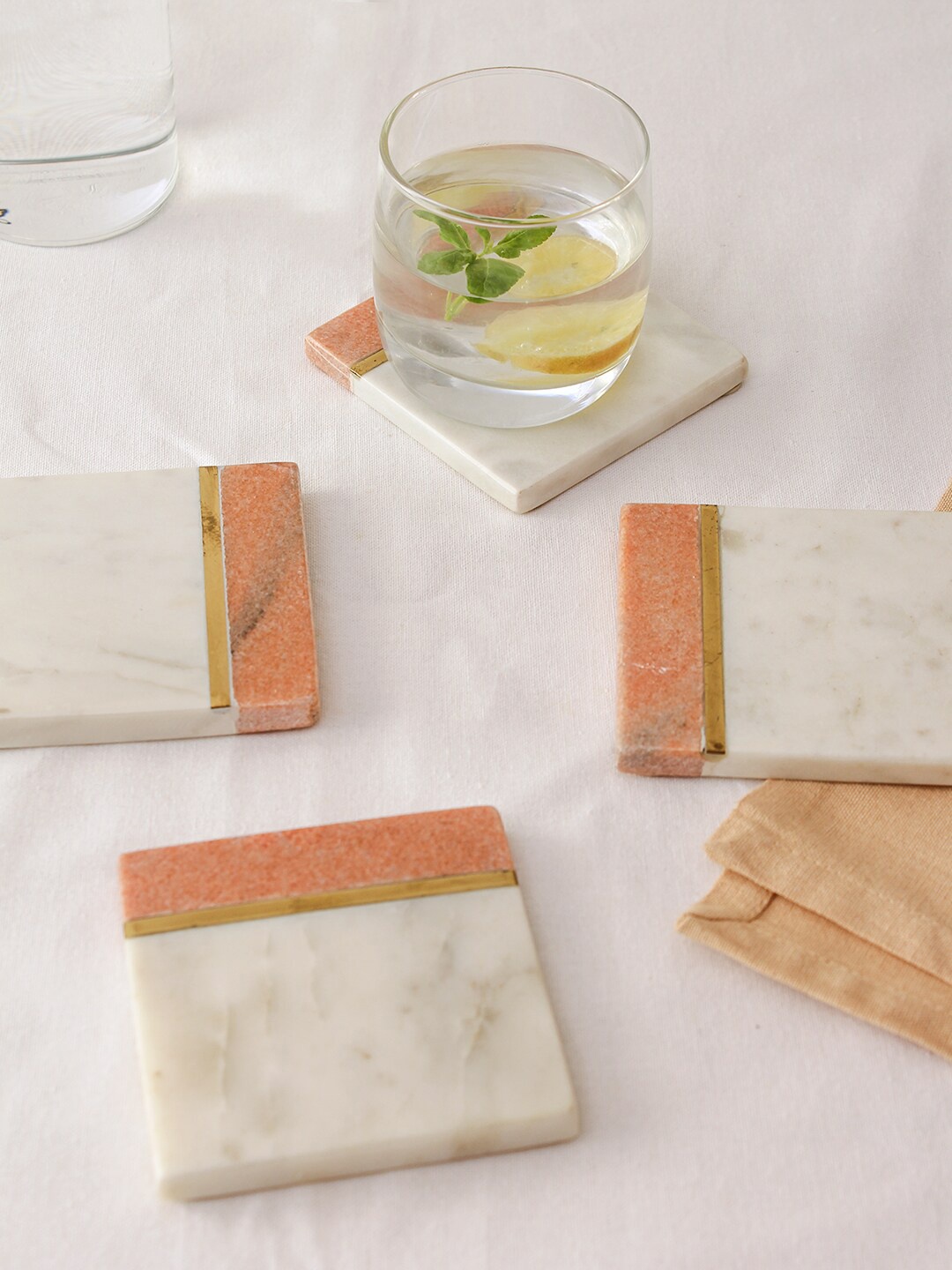 

House This Set Of 4 White & Coral Patterned Marble Coasters