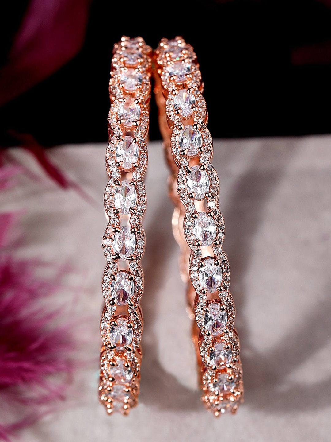 

Rubans Set of 2 Rose Gold Plated Green Stone Studded American Diamond Set of 2 Bangles.