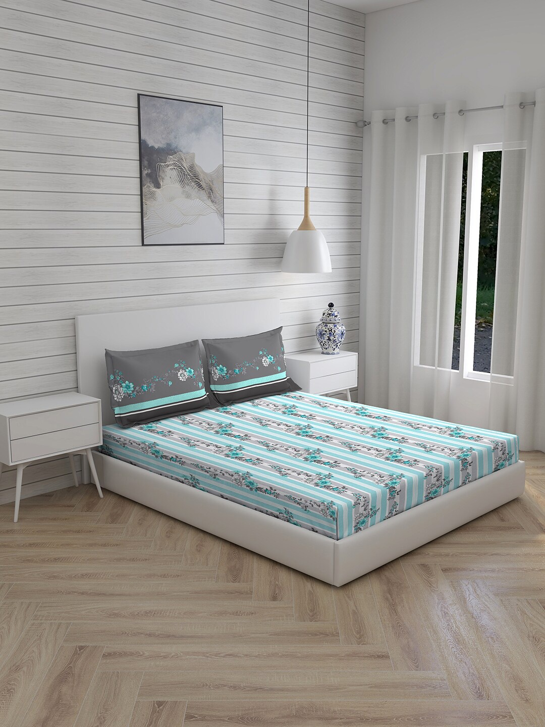

Layers Blue & White Floral 104 TC Queen Bedsheet with 2 Pillow Covers