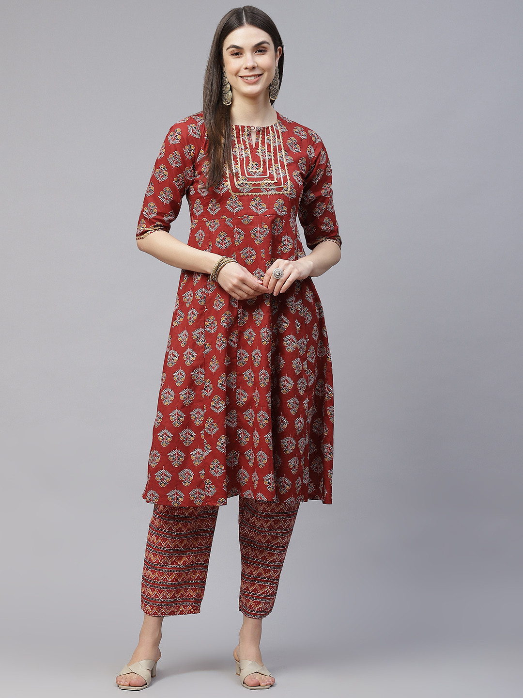 

SILVER STOCK Women Rust Red Pure Cotton Ethnic Motifs Printed Kurta with Trousers
