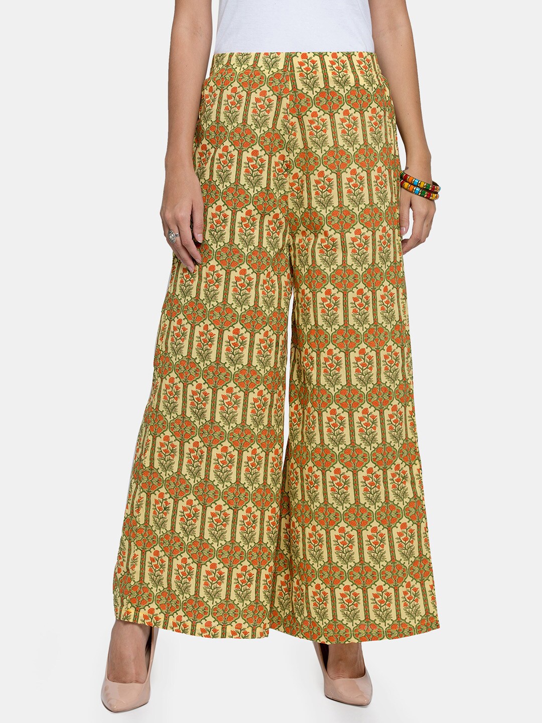 

Enchanted Drapes Women Yellow & Orange Pure Cotton Ethnic Motifs Printed Knitted Palazzos