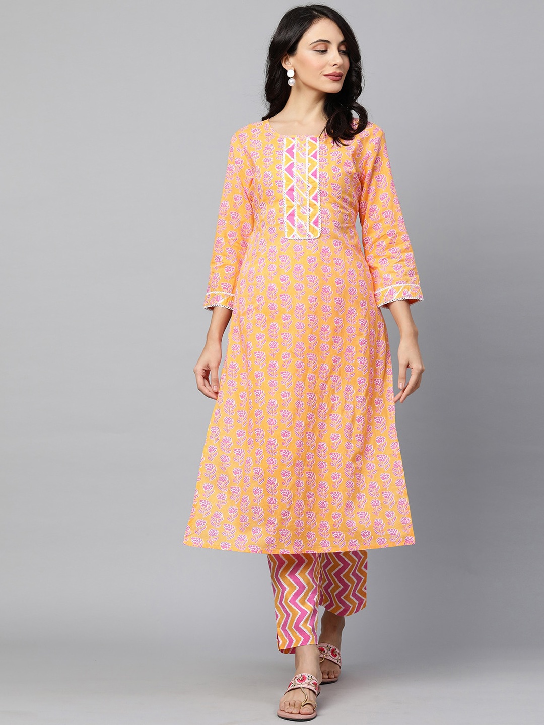 

FASHOR Women Yellow Floral Printed Pure Cotton Kurta with Trousers