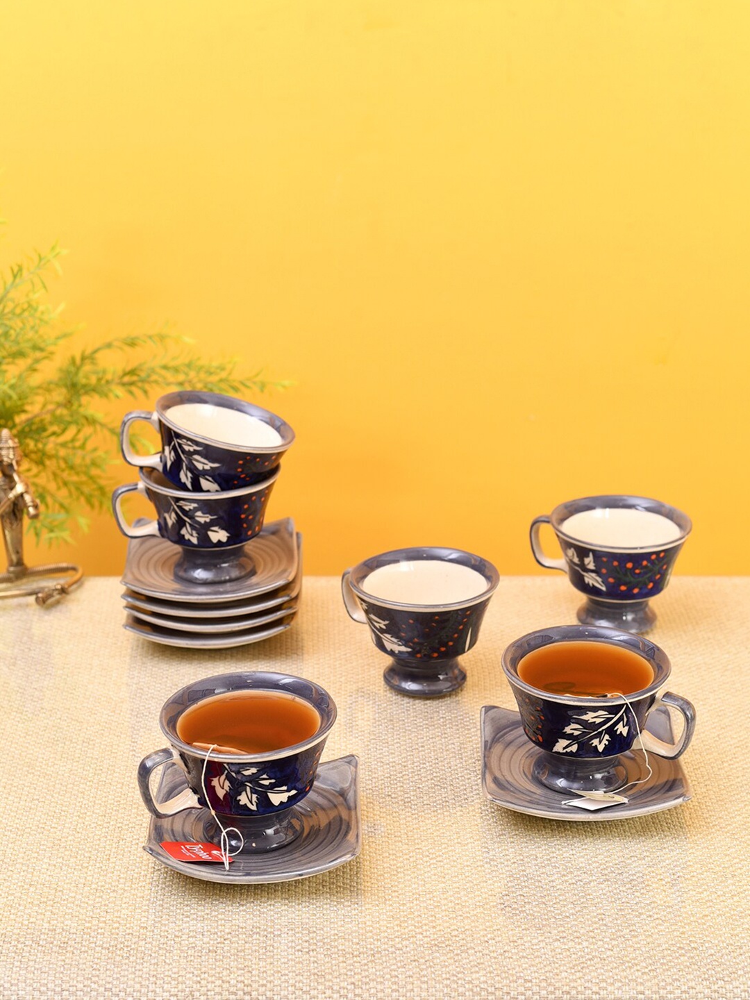 

AAKRITI ART CREATIONS Navy Blue & Cream-Coloured Ceramic Glossy Cups & Saucers