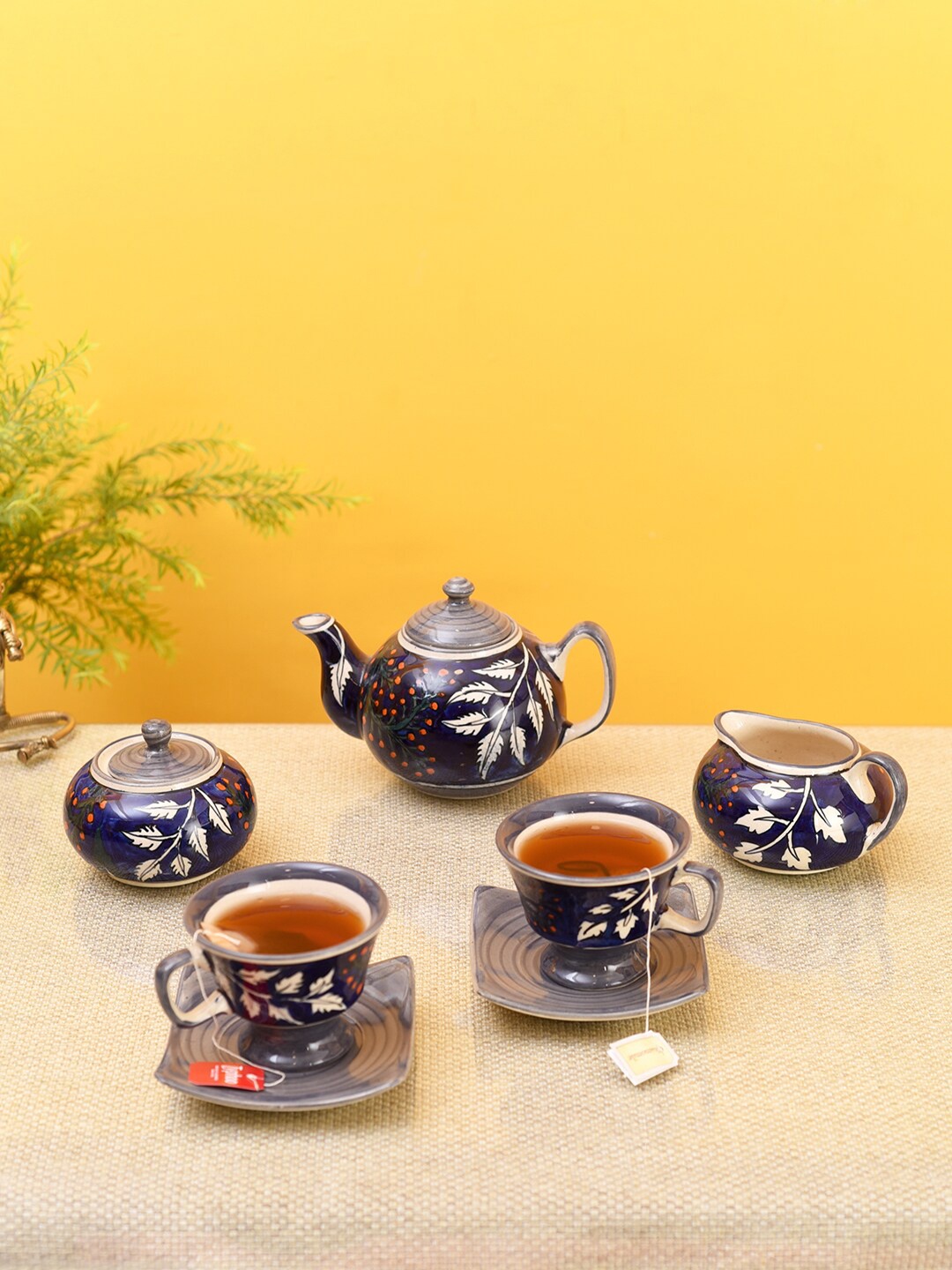 

AAKRITI ART CREATIONS Blue & Cream-Coloured Printed Ceramic Matte Cups and Saucers Set of Cups and Mugs