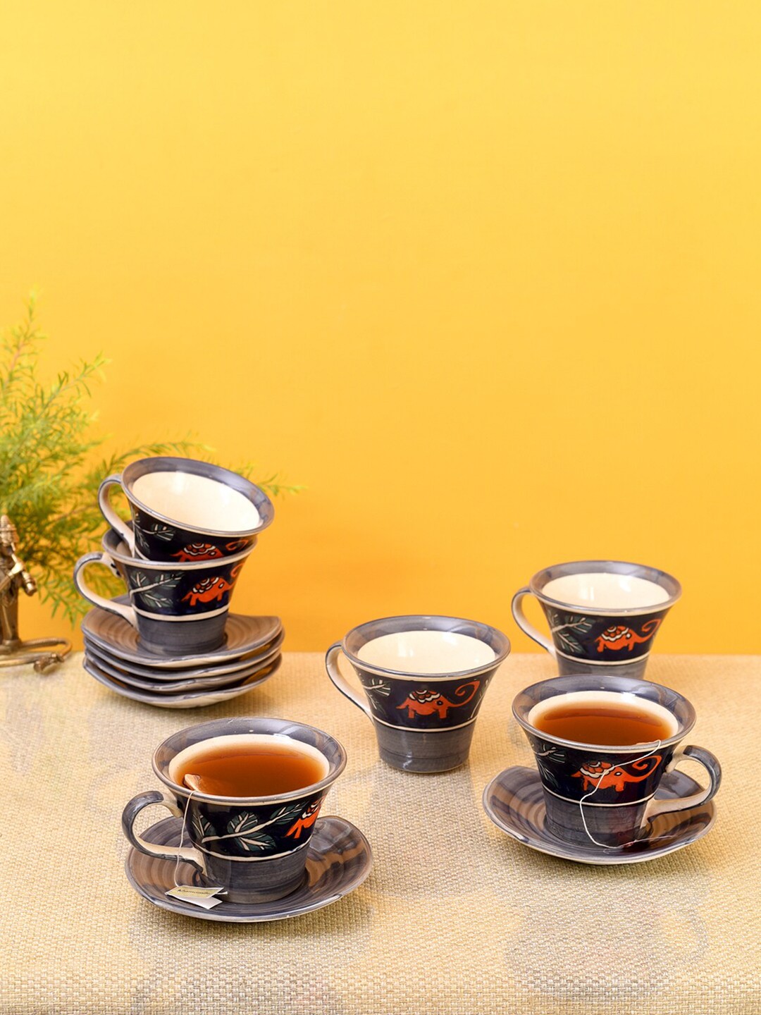 

AAKRITI ART CREATIONS Grey & Orange Printed Ceramic Glossy Cups and Saucers