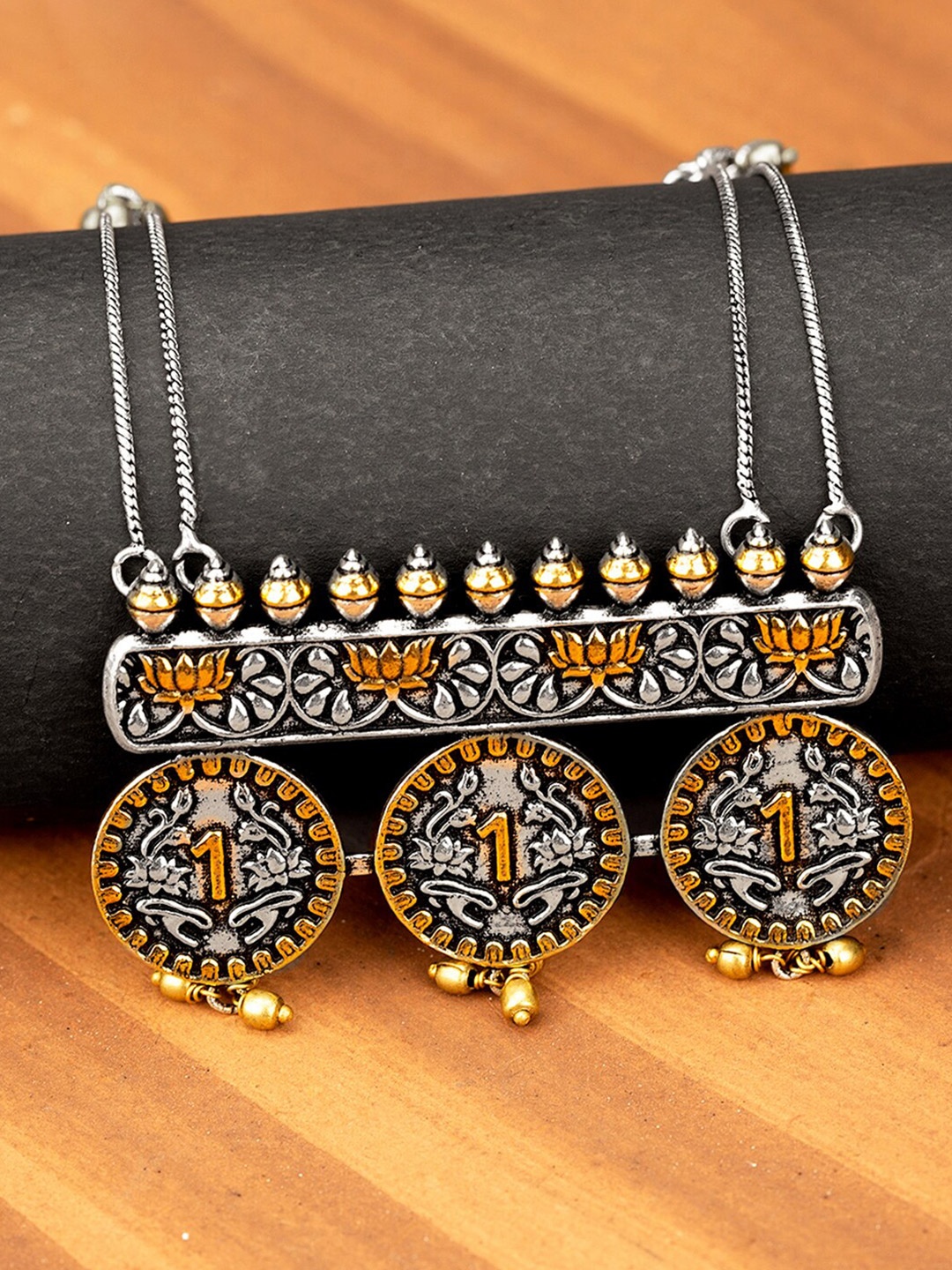 

Voylla Silver-Toned & Gold-Toned Brass Gullak Coin Shape Gungroo Necklace