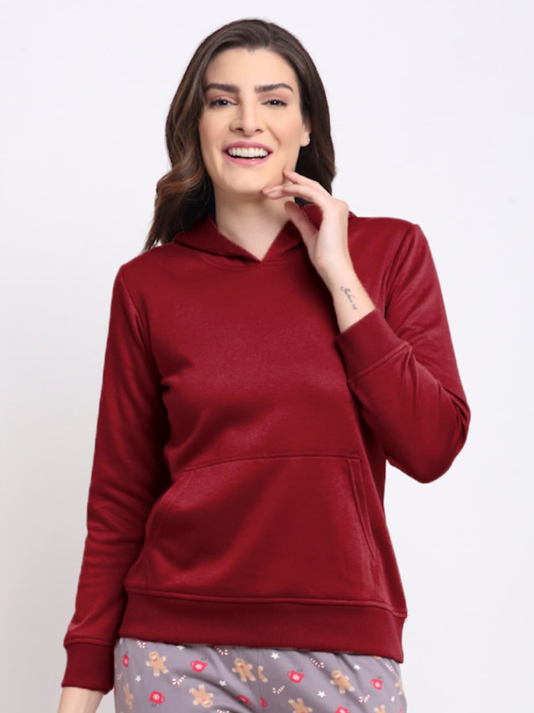 

Kanvin Women Maroon Hooded Sweatshirt