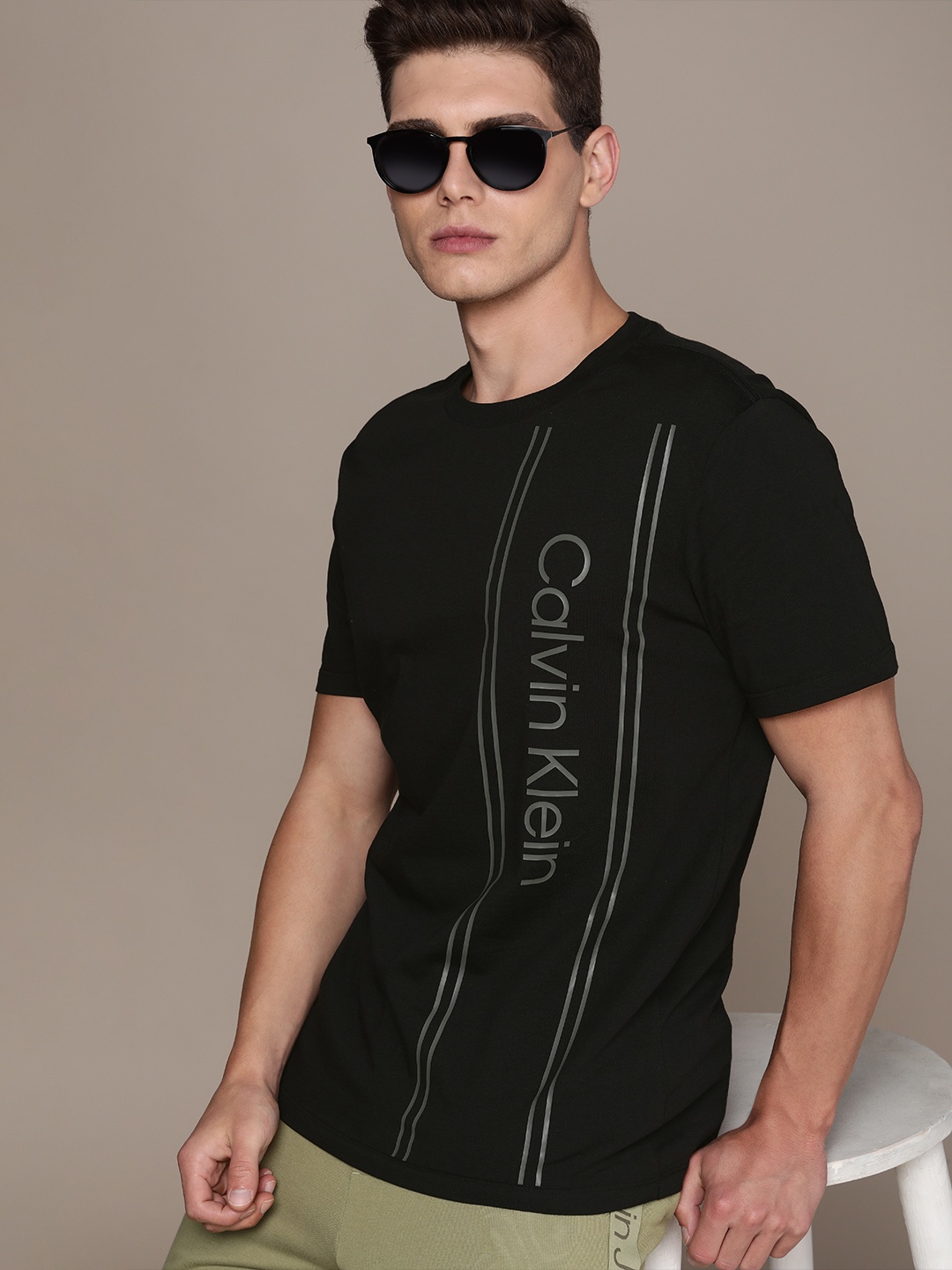 

Calvin Klein Jeans Men Black Brand Logo Placement Print Round Neck Pure Cotton T-shirt