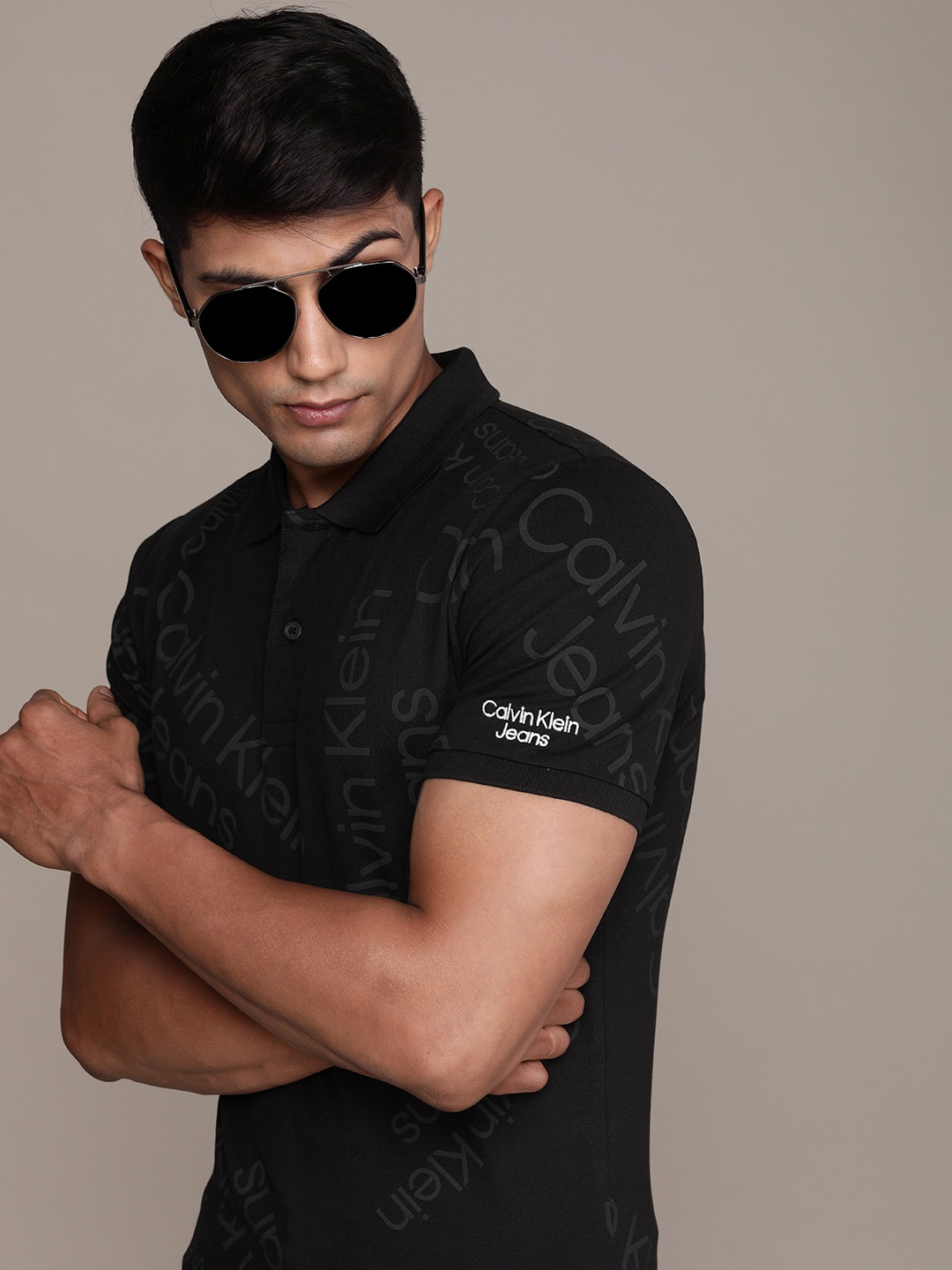 

Calvin Klein Jeans Men Black Brand Logo Printed Polo Collar T-shirt