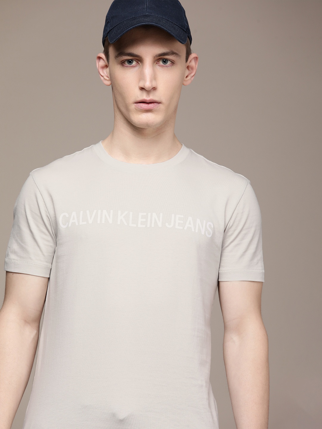 

Calvin Klein Jeans Men Grey Typography Printed Pure Cotton Slim Fit T-shirt