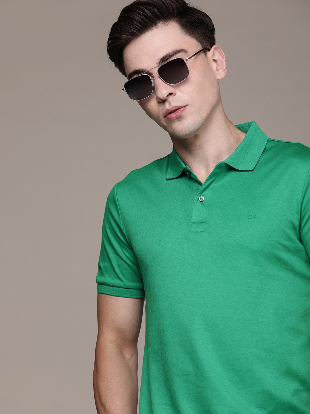 

Calvin Klein Jeans Men Green Polo Collar Slim Fit T-shirt
