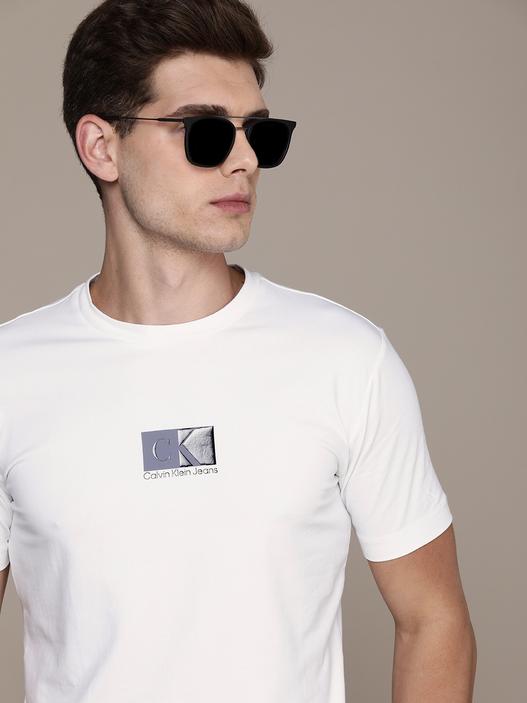 

Calvin Klein Jeans Men White Brand Logo Printed Slim Fit T-shirt