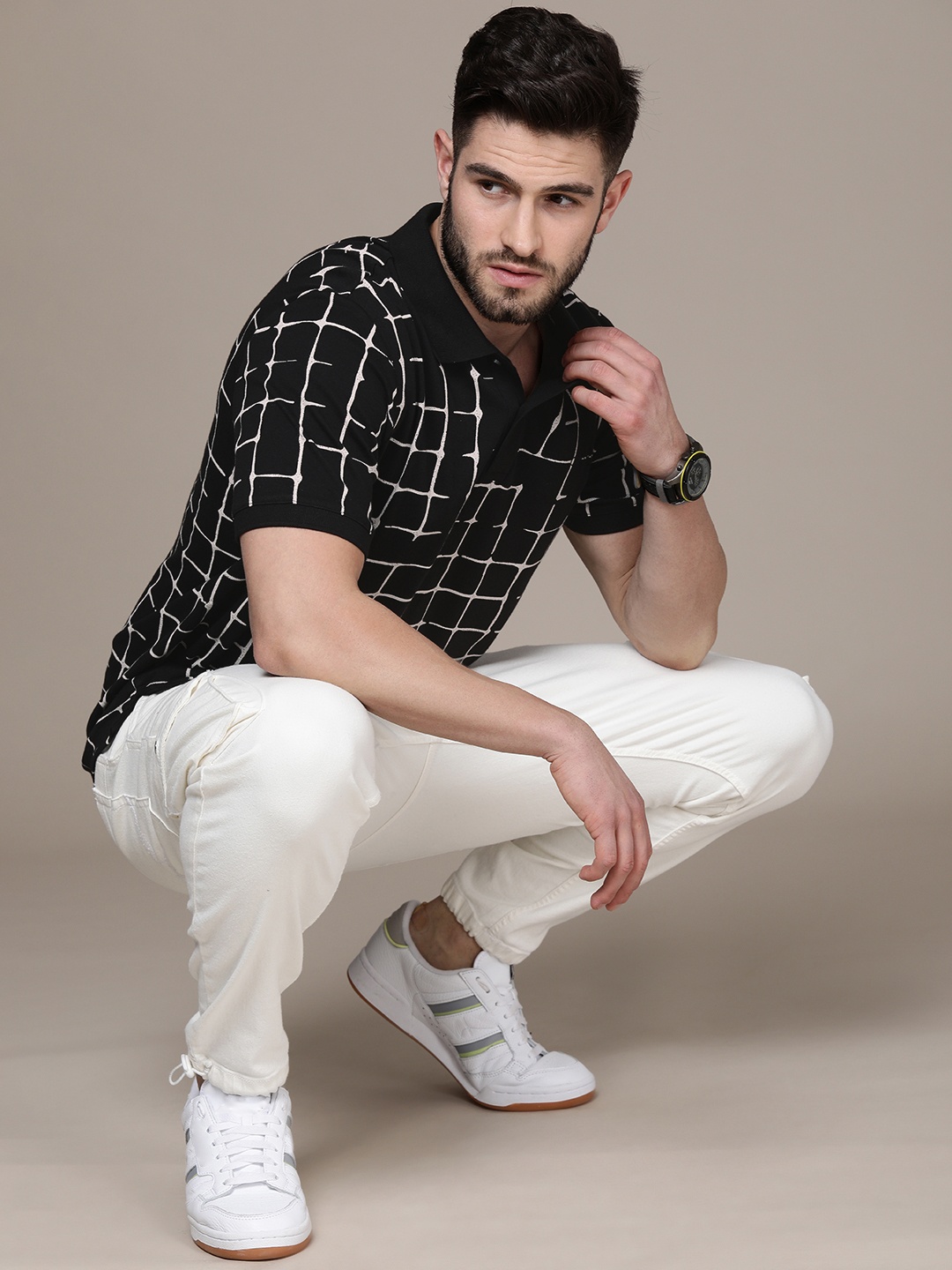 

Calvin Klein Jeans Men Black & White Checked Polo Collar Pure Cotton T-shirt