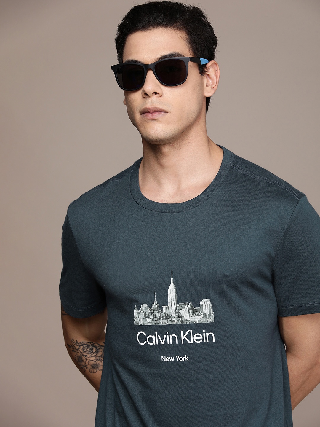 

Calvin Klein Jeans Men Blue Brand Logo Printed Pure Cotton T-shirt
