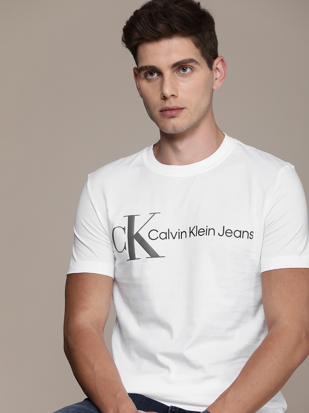 

Calvin Klein Jeans Men White Typography Printed Pure Cotton Slim Fit T-shirt