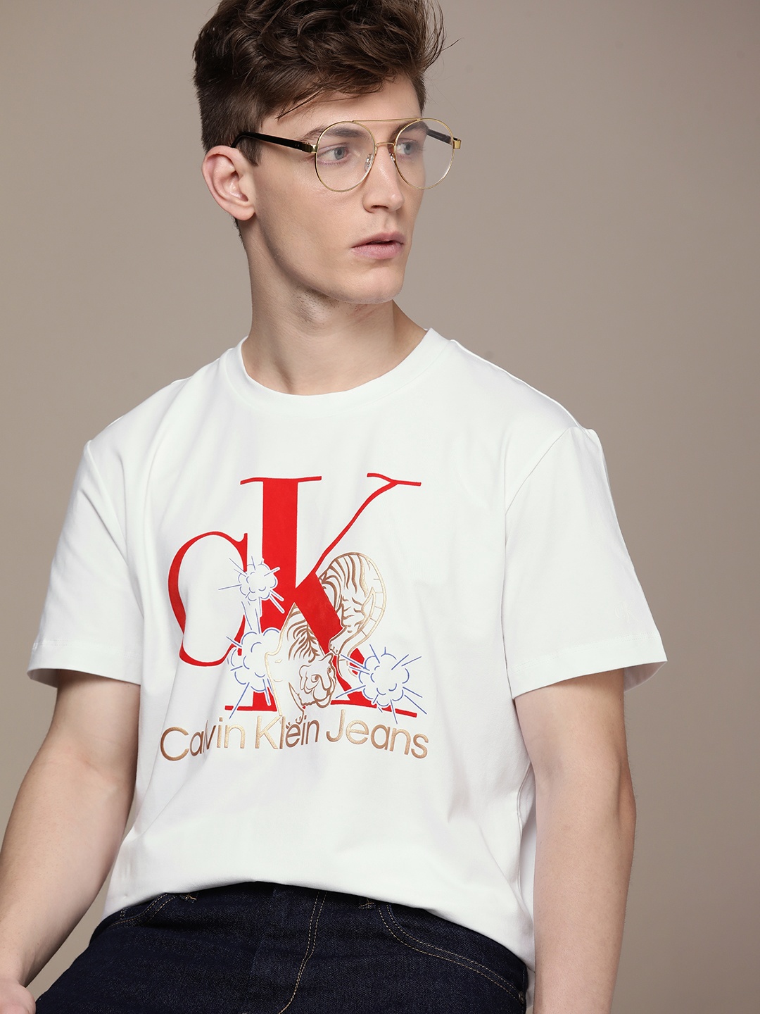 

Calvin Klein Jeans Men White Pure Cotton Graphic Printed T-shirt