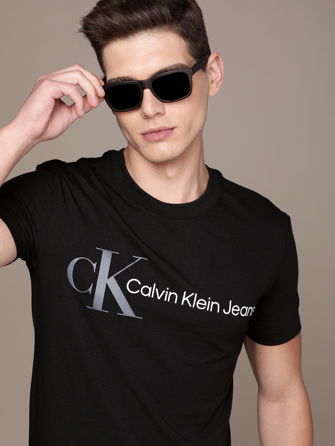 

Calvin Klein Jeans Men Black Brand Logo Print Round Neck Pure Cotton Slim Fit T-shirt