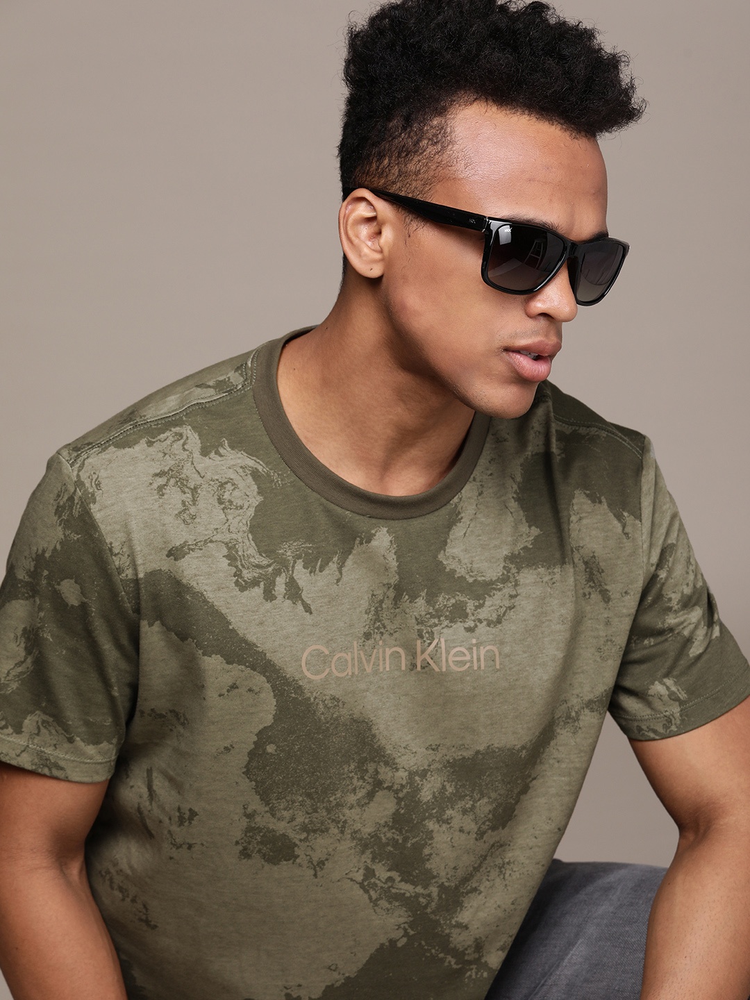 

Calvin Klein Jeans Men Olive Green Brand Logo Printed Pure Cotton T-shirt