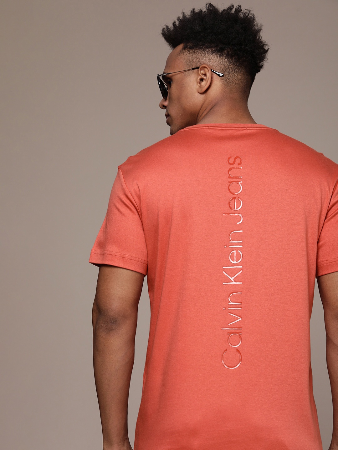 

Calvin Klein Jeans Brand Logo Printed Pure Cotton T-shirt, Coral