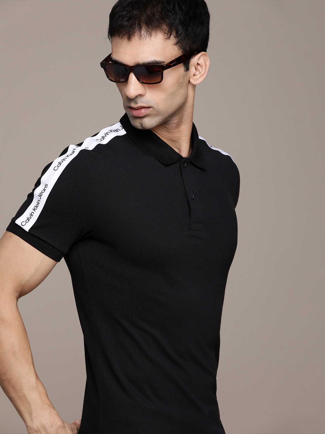 

Calvin Klein Jeans Men Black & White Printed Polo Collar Slim Fit T-shirt