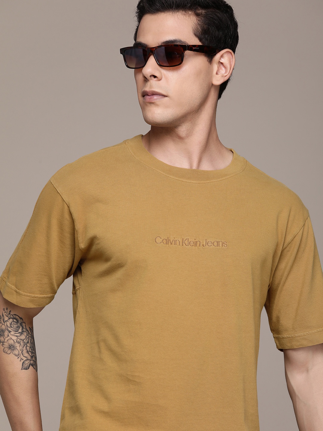 

Calvin Klein Jeans Men Brown Brand Logo Embellished Casual T-shirt