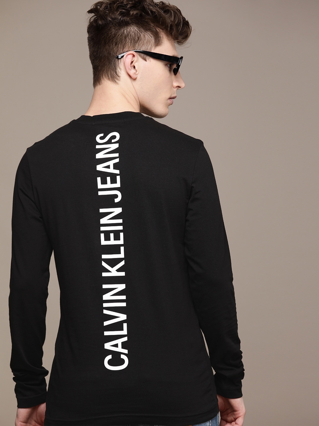 

Calvin Klein Jeans Men Black Typography Printed Pure Cotton Slim Fit T-shirt