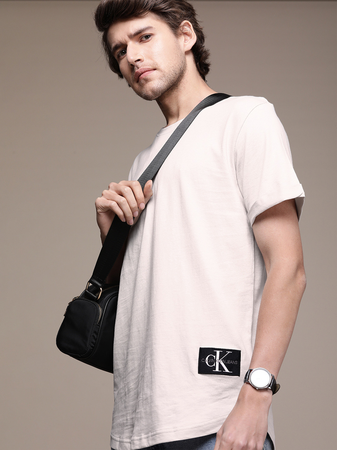 

Calvin Klein Jeans Men Off White Pure Cotton T-shirt with Logo Print Detailing