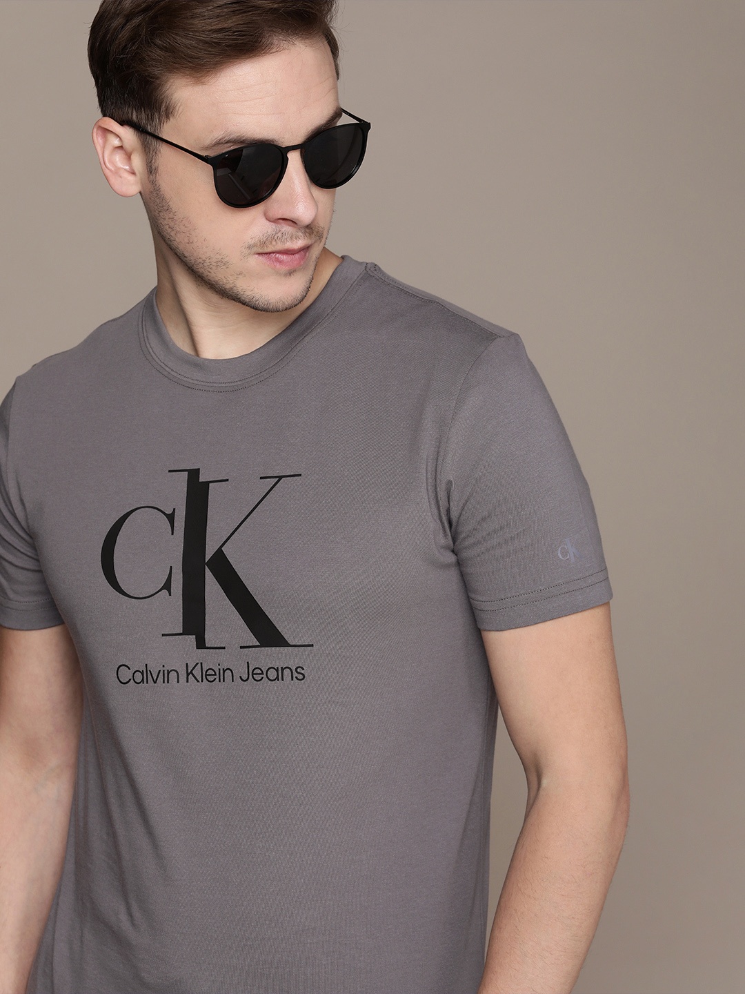

Calvin Klein Jeans Men Grey Brand Logo Printed Pure Cotton Slim Fit T-shirt
