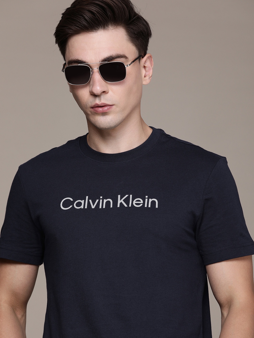 

Calvin Klein Jeans Men Navy Blue Typography Printed Slim Fit T-shirt