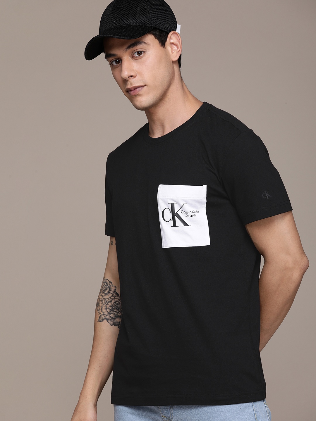 

Calvin Klein Jeans Men Black & White Brand Logo Printed Pure Cotton Casual T-shirt