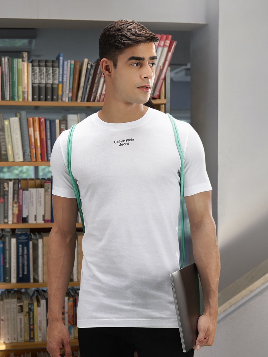 

Calvin Klein Jeans Men White Solid Pure Cotton T-shirt