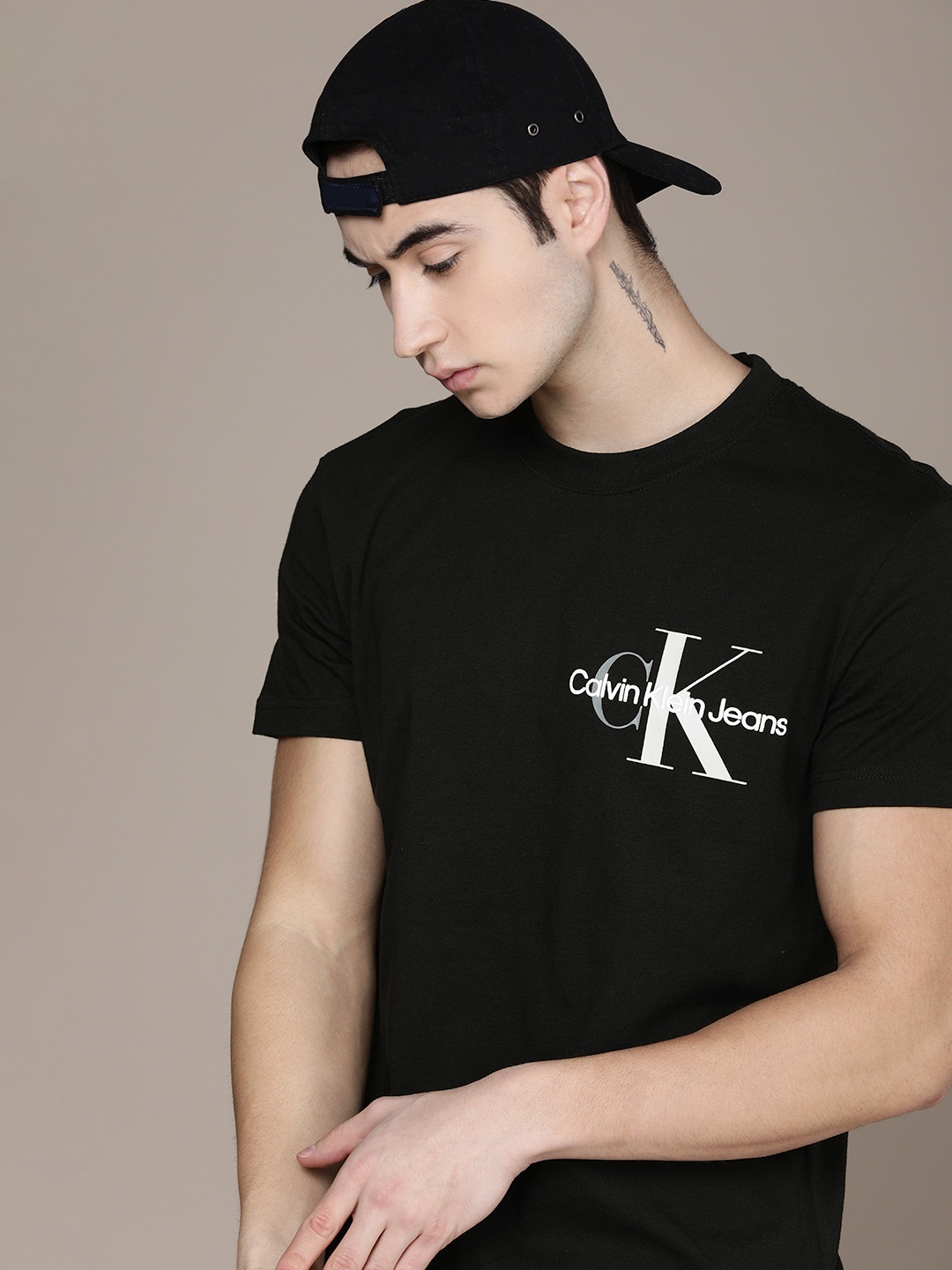 

Calvin Klein Jeans Men Black Brand Logo Printed Pure Cotton T-shirt