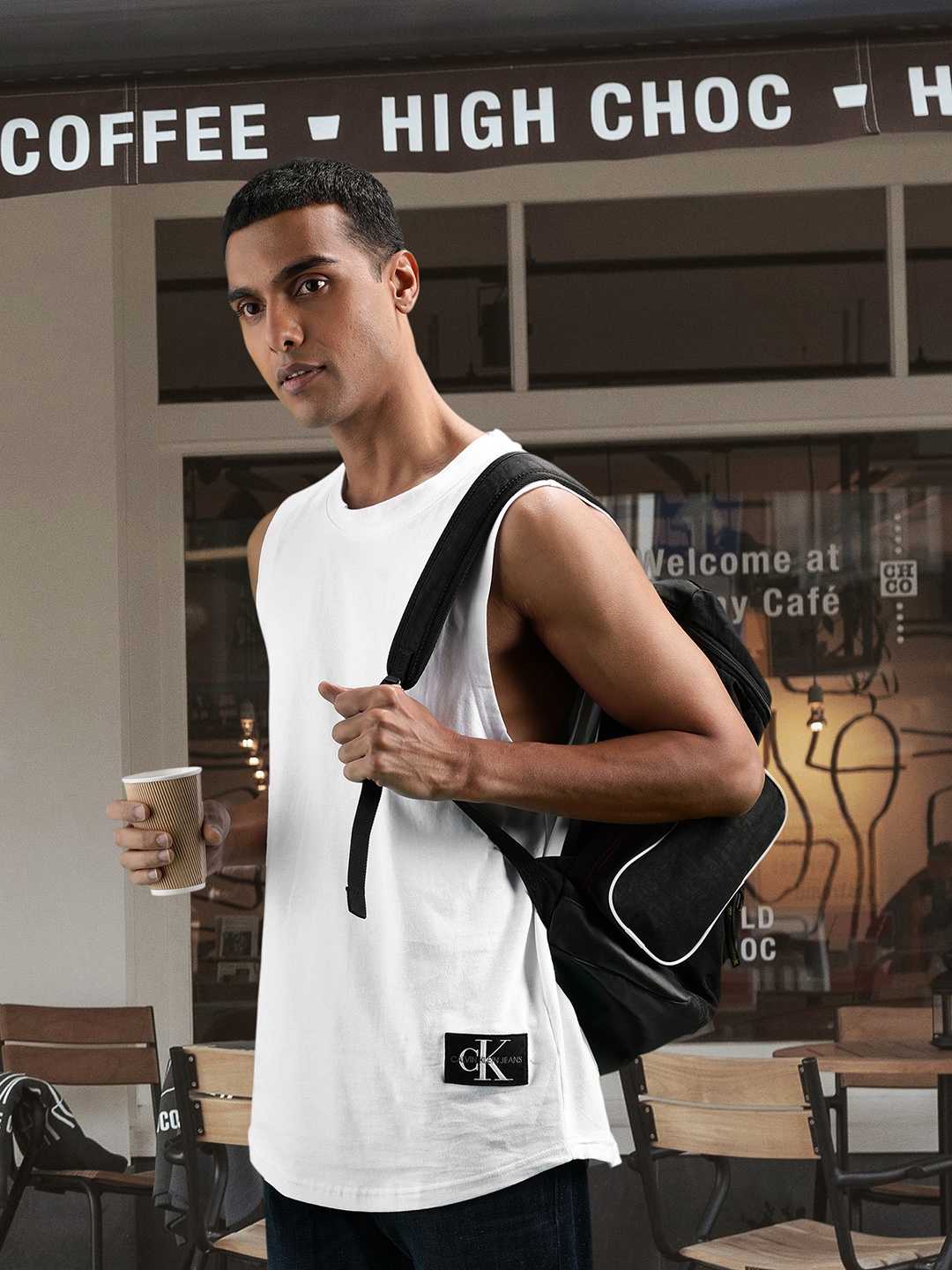 

Calvin Klein Jeans Men White Solid Sleeveless Pure Cotton T-shirt