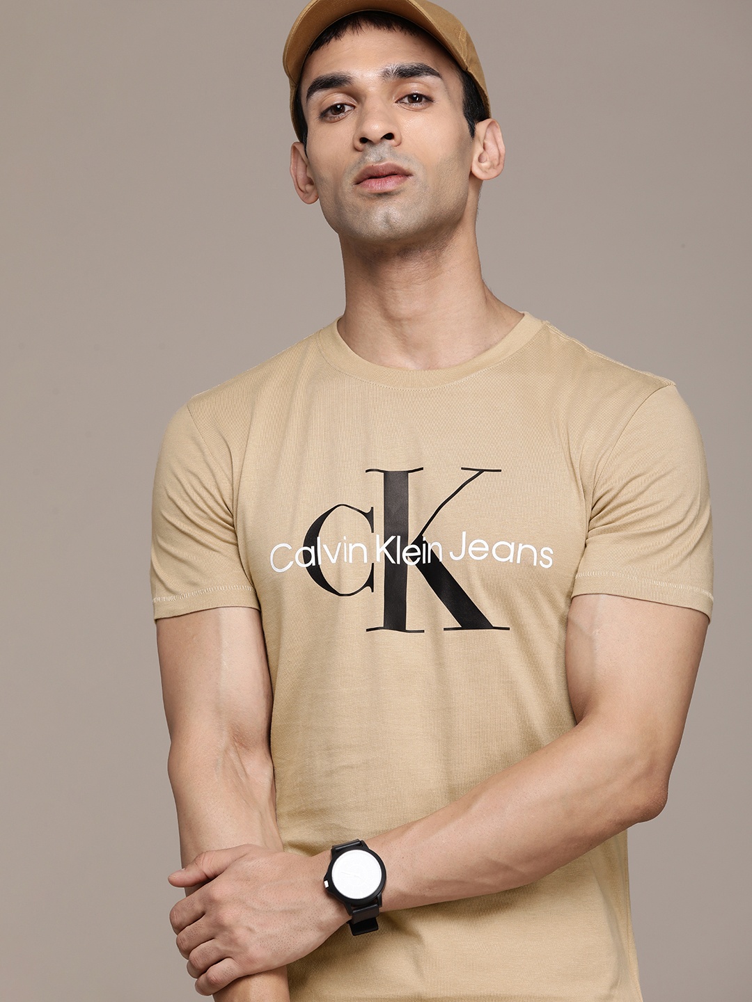 

Calvin Klein Jeans Men Brown & Off White Typography Printed Organic Cotton Casual T-shirt