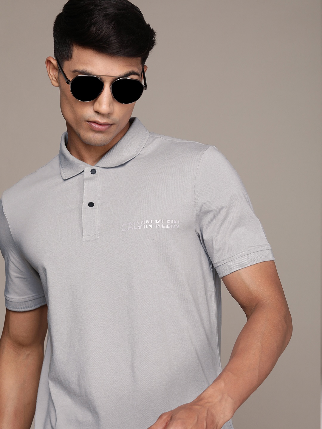 

Calvin Klein Jeans Men Grey Solid Polo Collar Applique Slim Fit T-shirt