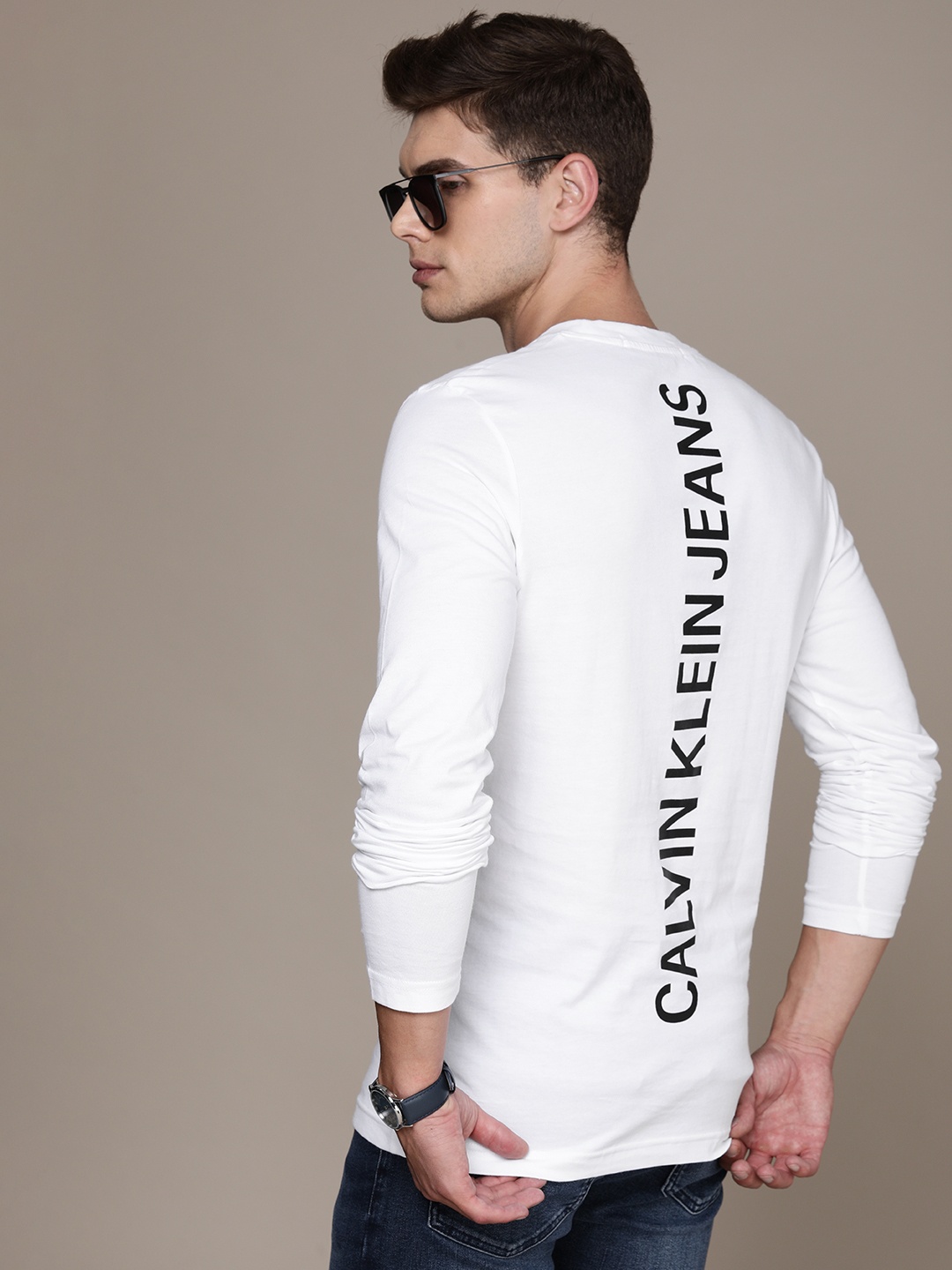 

Calvin Klein Jeans Men White Typography Printed Pure Cotton Slim Fit T-shirt