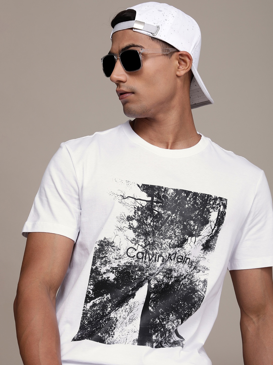 

Calvin Klein Jeans Men White Graphic Printed Pure Cotton Casual T-shirt