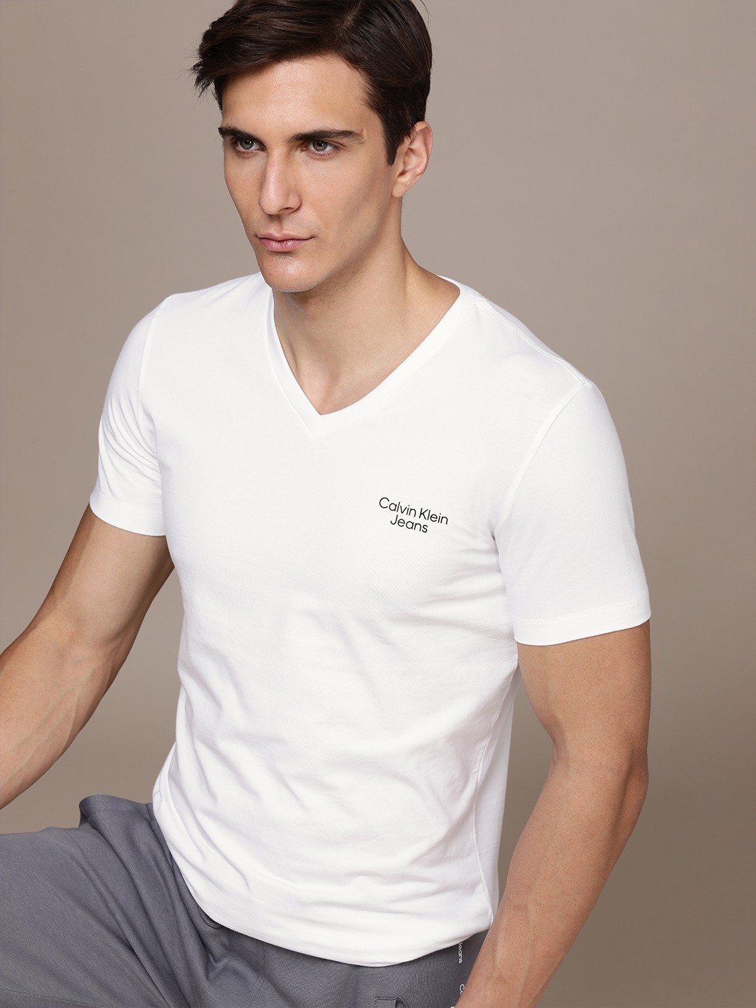 

Calvin Klein Jeans Men White V-Neck T-shirt with Printed Detail