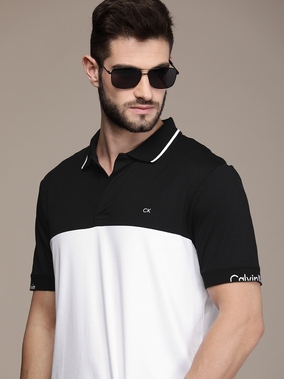 

Calvin Klein Jeans Men Black & White Brand Logo Colourblocked Polo Collar Casual T-shirt