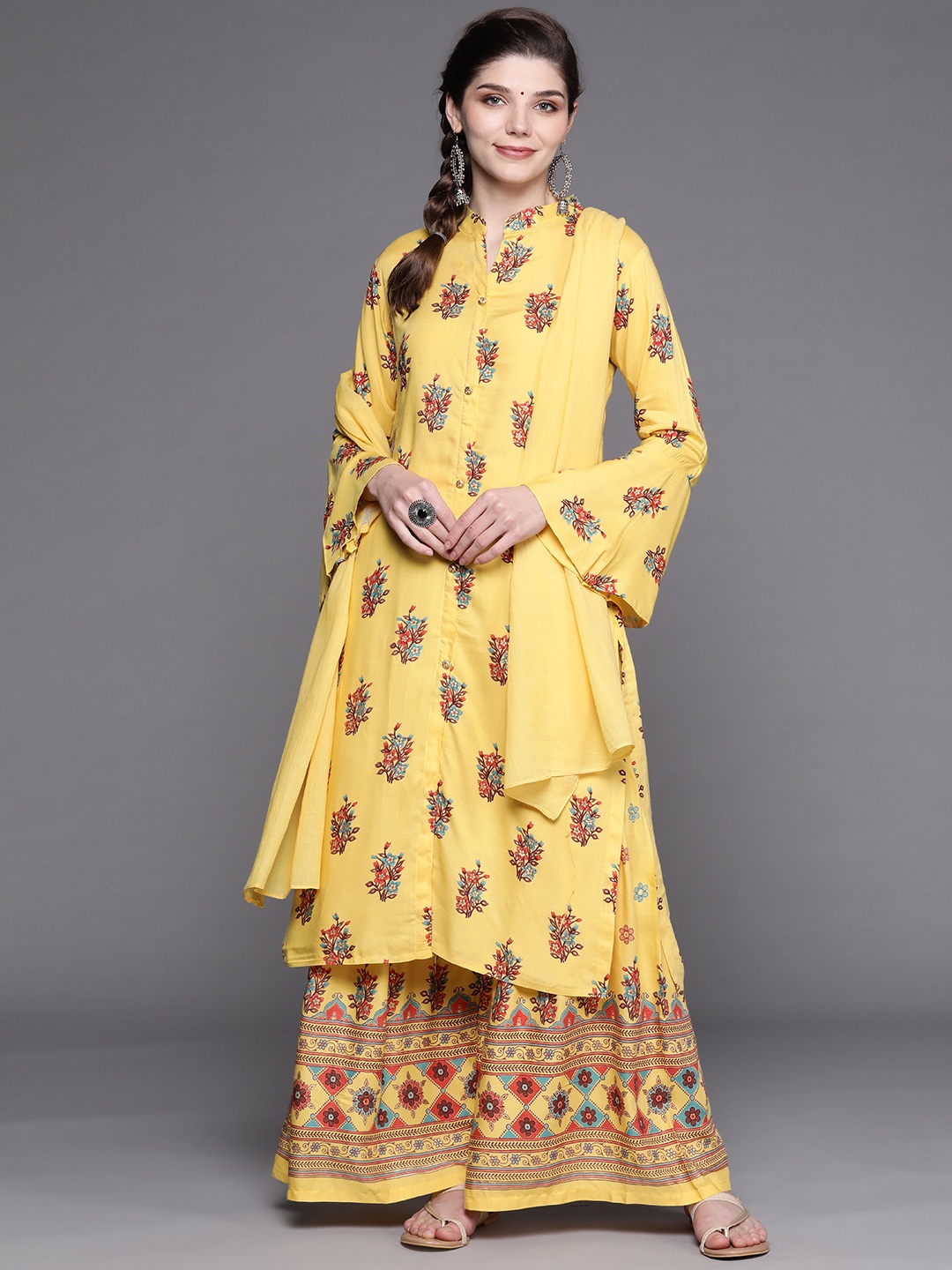 

Chhabra 555 Women Yellow Floral Printed Made to Measure Embellished Kurta Set & Dupatta