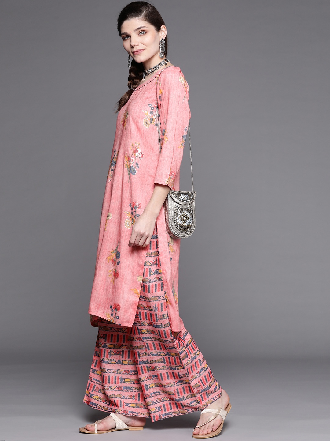 

Chhabra 555 Women Pink Printed Embellished Kurta with Palazzos