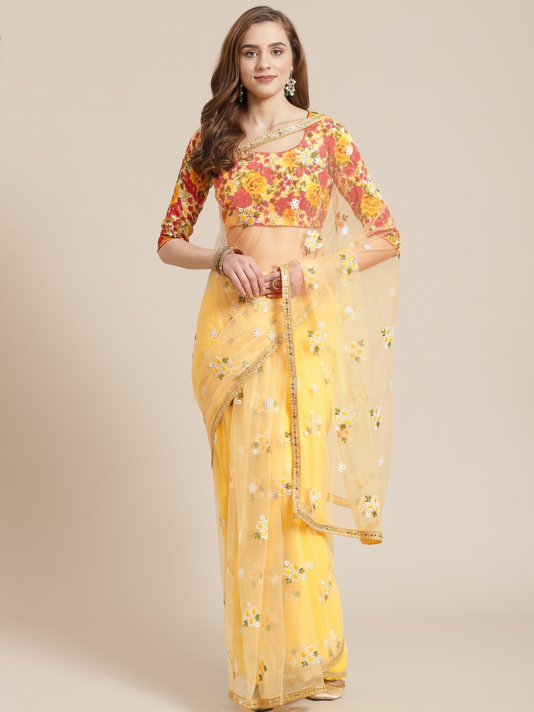 

Chhabra 555 Yellow Floral Embroidered Net Saree with Sequinned Border