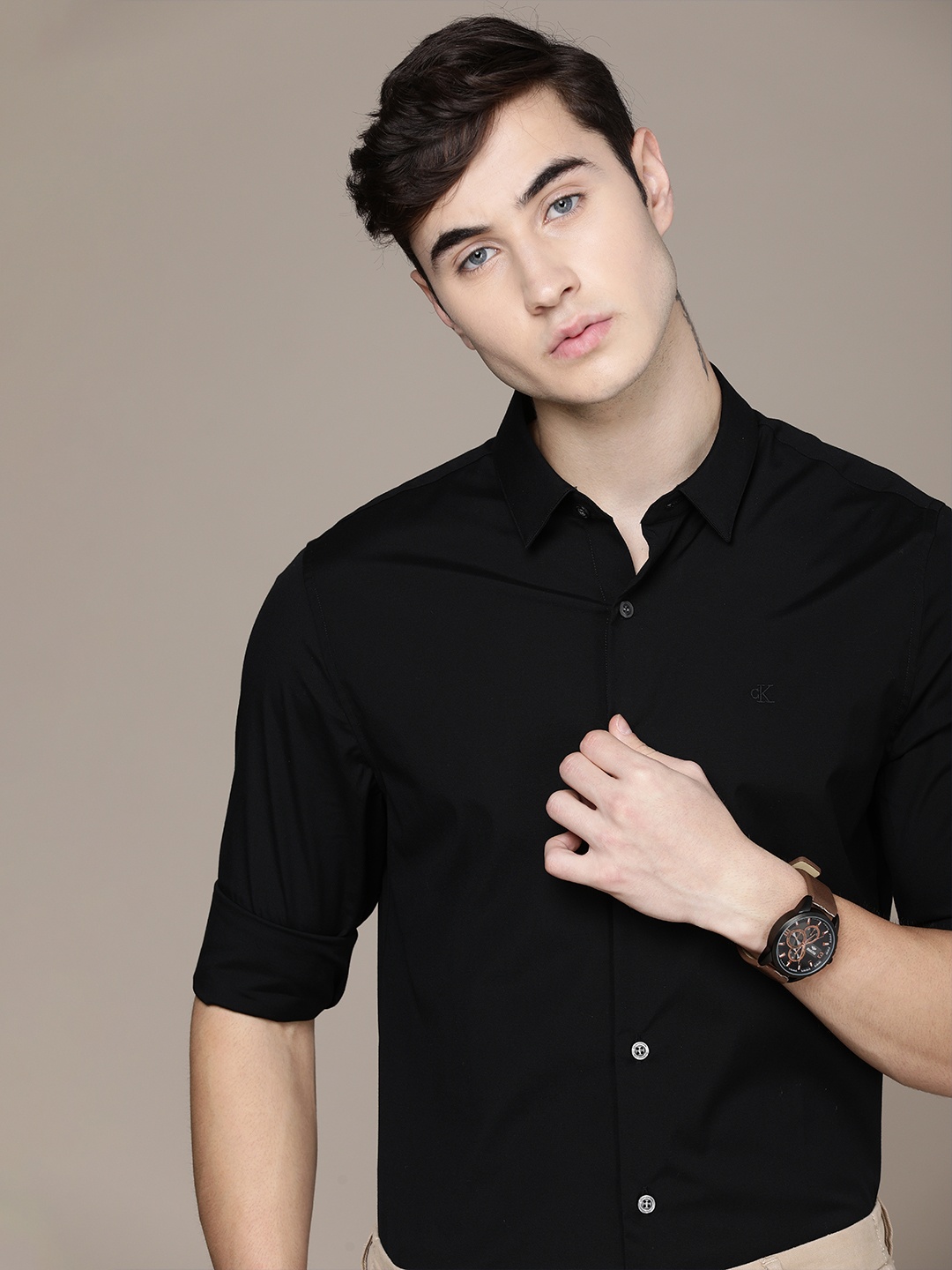 

Calvin Klein Jeans Men Black Slim Fit Solid Smart Casual Shirt
