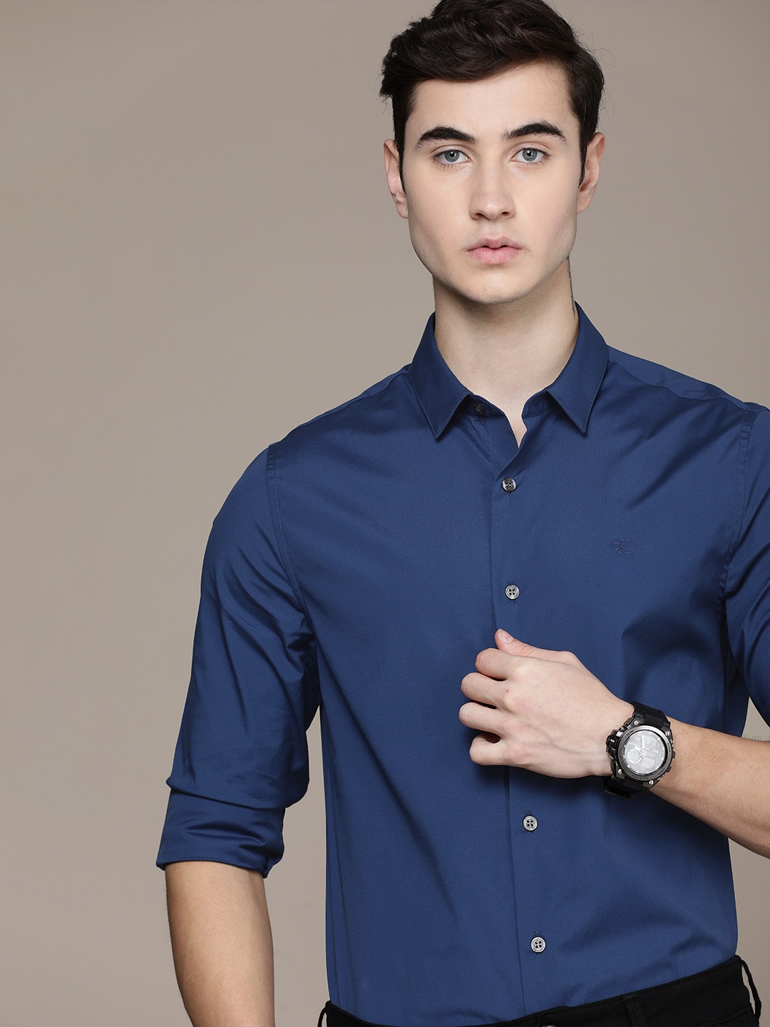 

Calvin Klein Jeans Men Navy Blue Slim Fit Solid Smart Casual Shirt