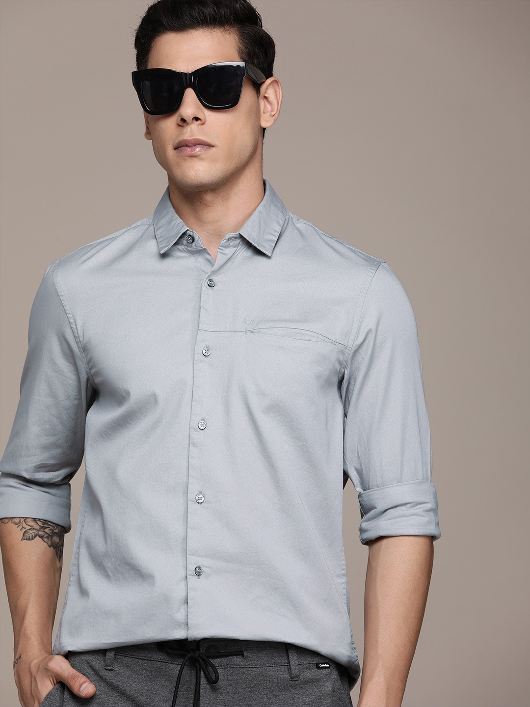 

Calvin Klein Jeans Men Grey Solid Slim Fit Casual Pure Cotton Shirt